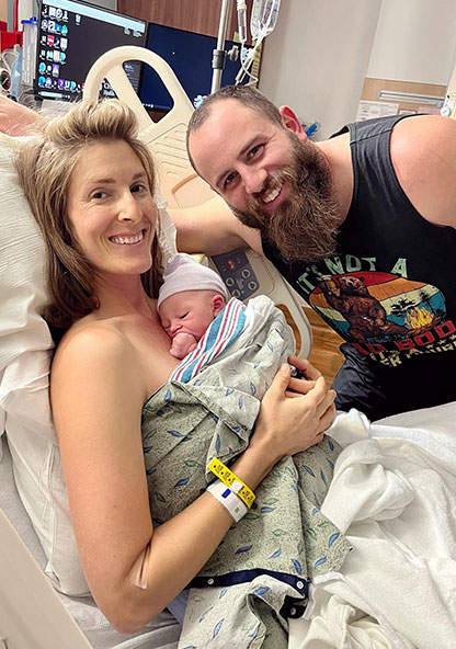 Karen and Ben Matthewson at CHRISTUS Children's holding newborn baby Luca.