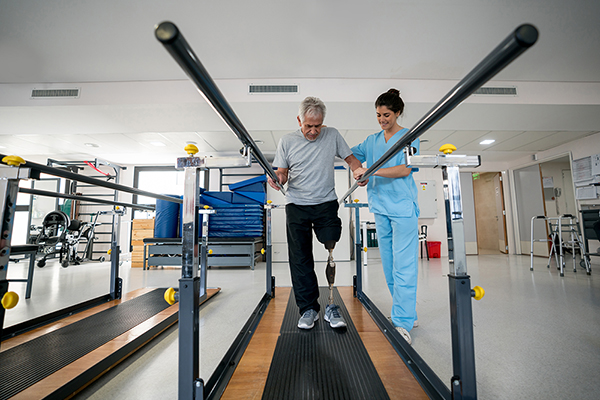 Senior Man with a Prosthetic Leg doing Physical Therapy